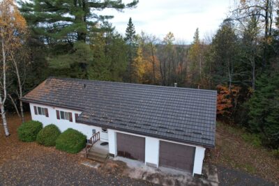Hy-Grade-Steel-Roofing-White-Siding-Dark-Brown-Roof