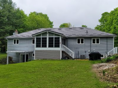 Hy-Grade-Steel-Roofing-System-Metal-Roofing-See-Our-Work-Dark-Brown-metal-roof-grey-siding-Elora, Ontario