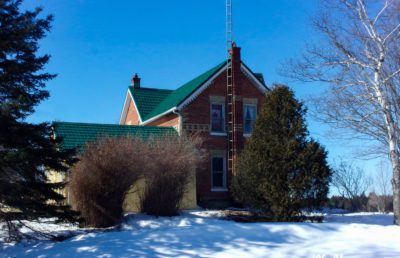 Hy-Grade-Steel-Roofing-System-Metal-Roofing-See-Our-Work-Hunter-Green-victorian-home-red-brick-Elmira-Ontario