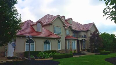 Hy-Grade-Steel-Roofing-System-Metal-Roofing-See-Our-Work-Canners-Brown-metal-roof-beige-siding