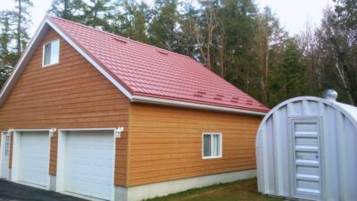 Hy-Grade-Steel-Roofing-System-Metal-Roofing-See-Our-Work-Canners-Brown-metal-roof-brown-wood-siding