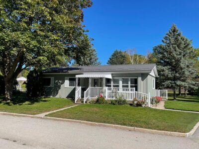 Hy-Grade-Steel-Roofing-Metal-Bungalow-Grey-Siding-Charcoal-Grey-Roof