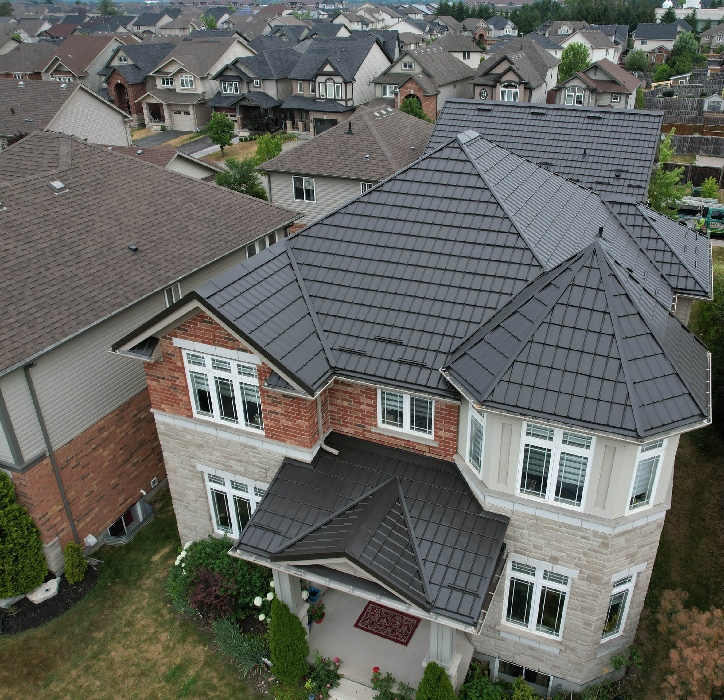 Drone picture of a house with a Dark Brown Hy-Grade Roof